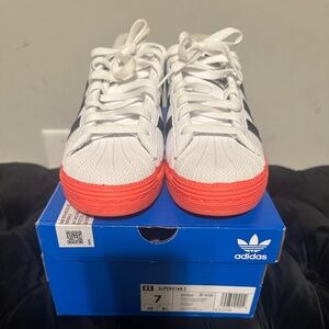 Adidas Superstar J Sneakers – White with Black Stripes & Red-ish Pink Sole